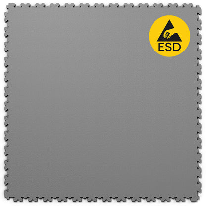 Dalle PVC clipsable Fortelock ESD XL 4mm - Grise. Conçue pour les environnements sensibles à l'électricité statique, idéale pour les laboratoires, salles informatiques et ateliers. Format XL pour une installation simple et rapide.