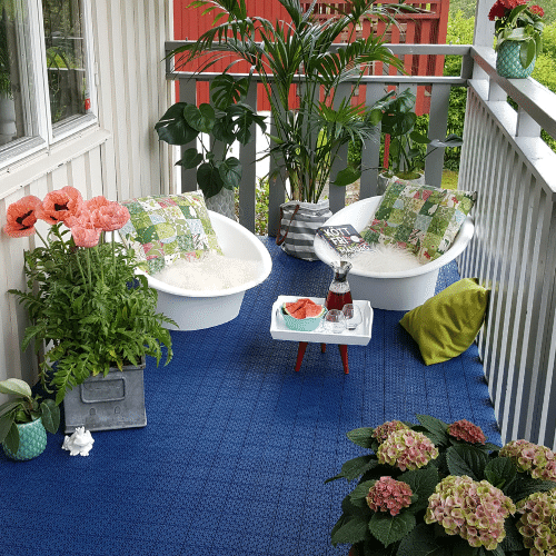 Hestra Universa 12 mm – bleu, sur un balcon