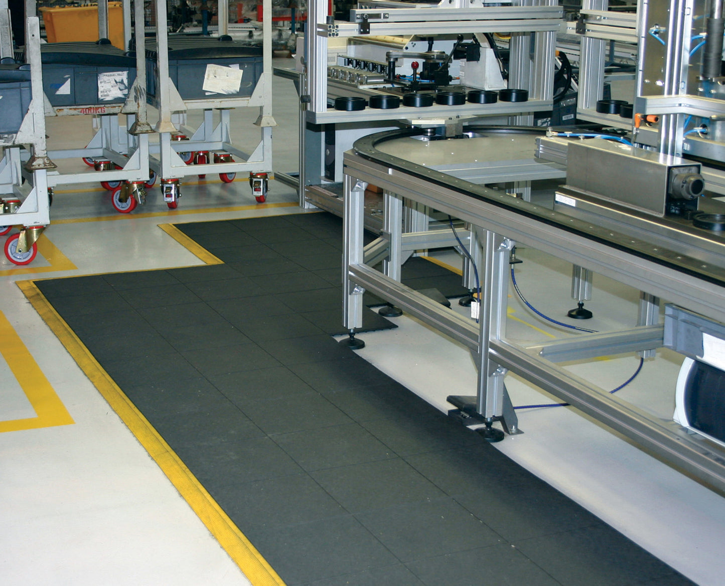 Fatigue-Step® Solid – Dalle anti-fatigue modulaire 18 mm à surface pleine (usage industriel)